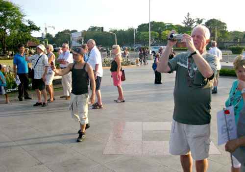 Tourists taking mementos