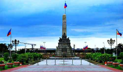 Rizal Park care philippine-islands” title=”Rizal Park on a clear day care philippine-islands” width=