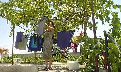  Filipina wife doing her laundry chore